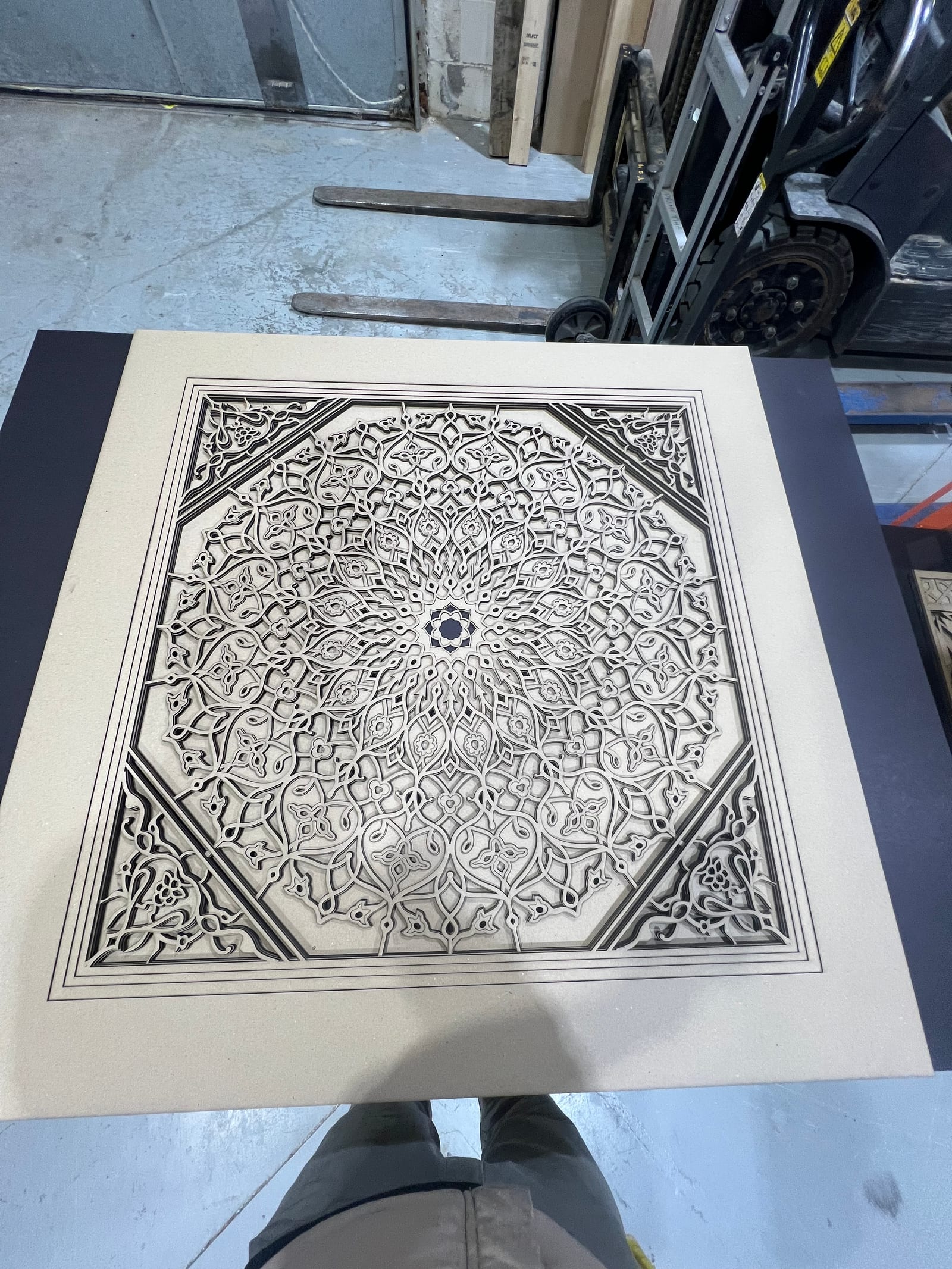 Arabesque Fire as a raw white-on-charcoal mandala cut sheet.