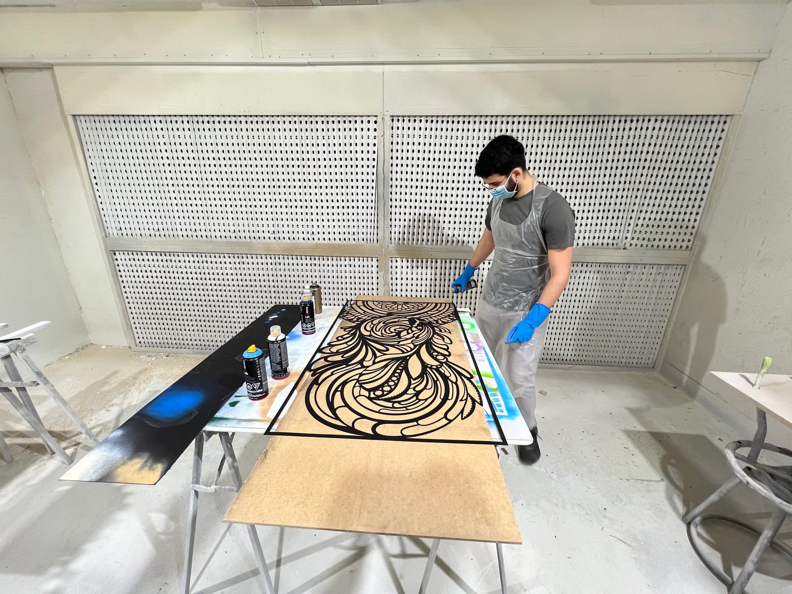 Geometric Tropical mid-paint in the spray booth, dark base coat going on.